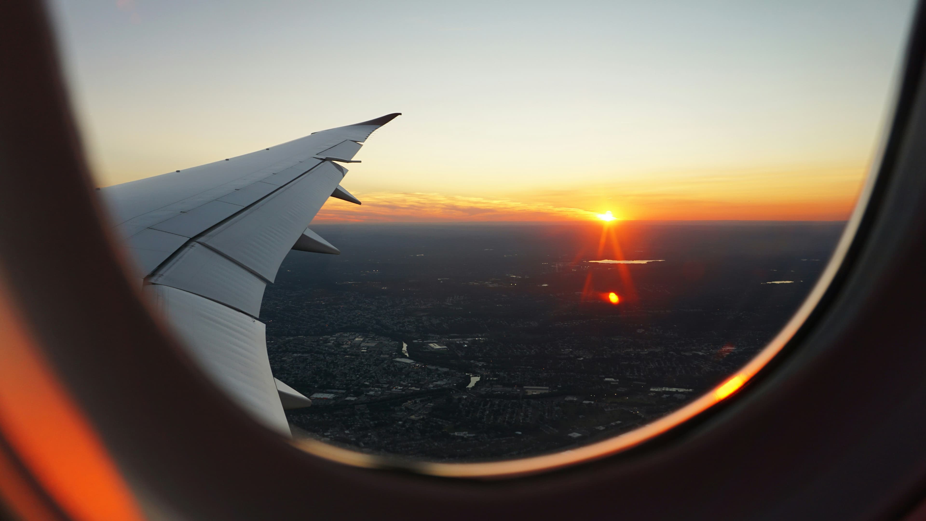 View of a sunset over Africa from an airplane window
